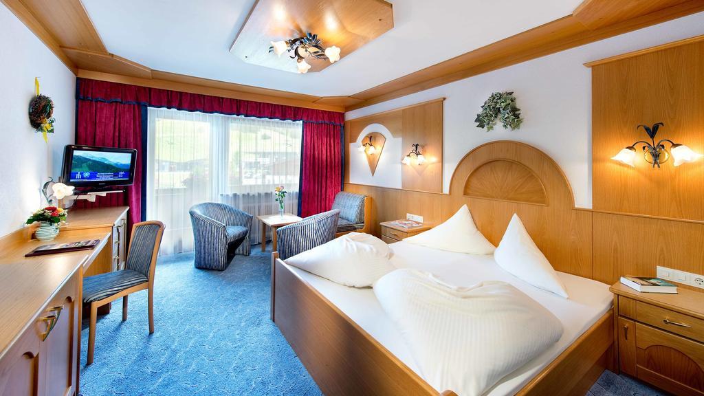 Hotel Bergland Lermoos Rom bilde